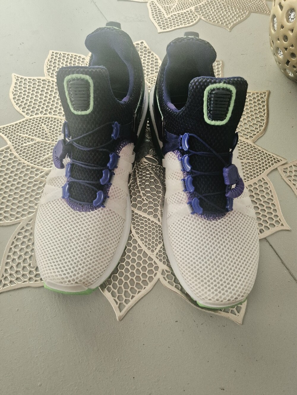 White and Purple Sneakers with Green Accents